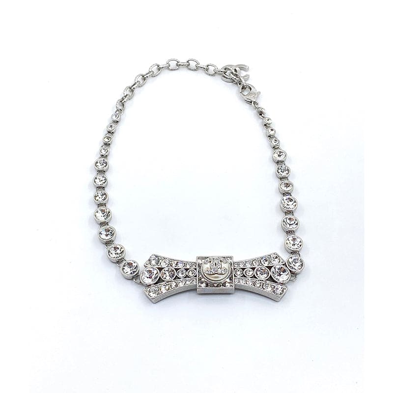 18K  Chanel Diamond Bow Tie Pendant Necklace
